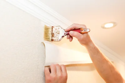 Pose de papier peint à Menet — revêtements muraux et toiles de verre
